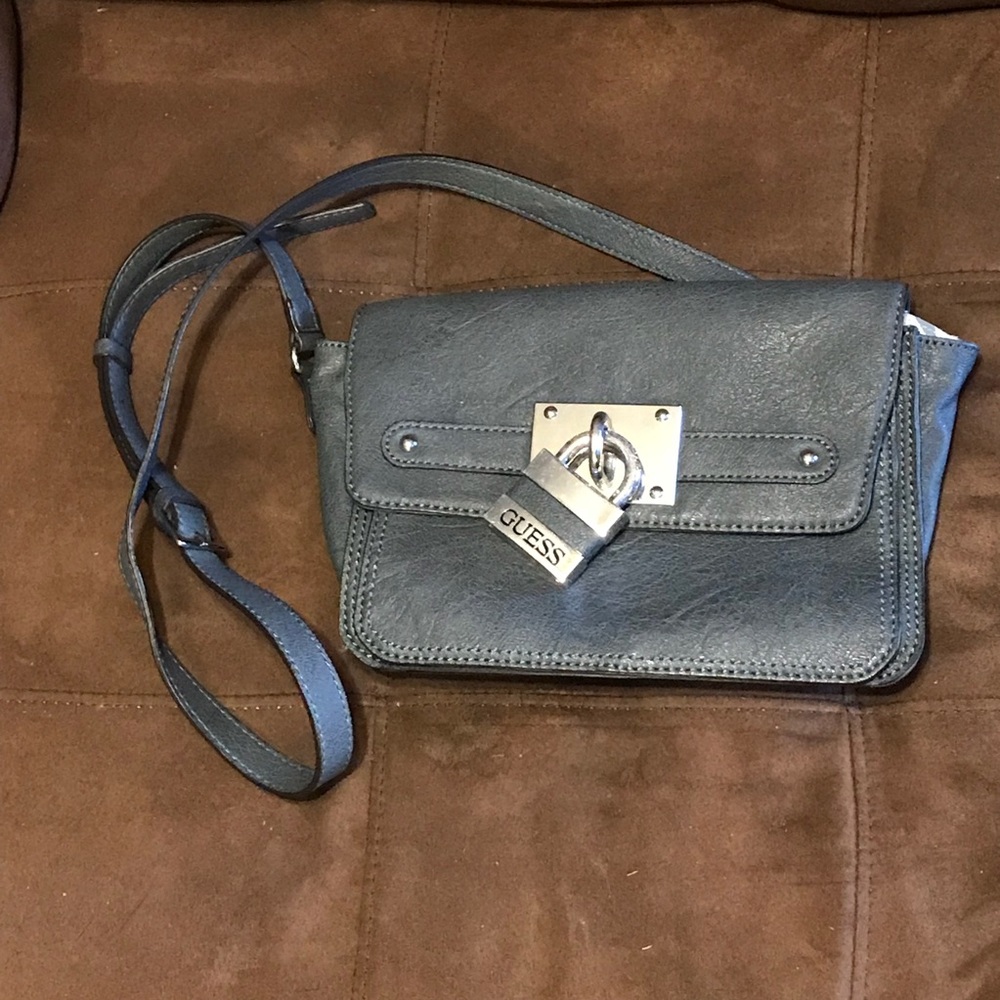 Medium size gray crossbody by Guess with padlock